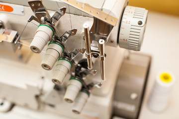 Thread Tangled Around Sewing Machine Take-up Arm. part of sewing machine, top view