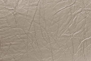 Leatherette beige color. Background, texture.