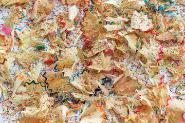 colorful shavings from pencils, background.