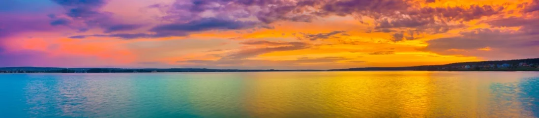 Foto op Canvas Sunset over the lake. Amazing panorama landscape © Olga Khoroshunova