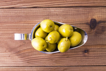 olives on wooden background