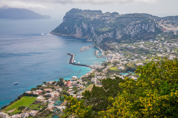 Fototapeta premium Aerial view of Capri island and grand marina bay, Napoli, Italy.