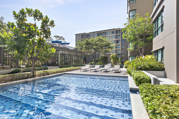 Pool swimming and garden, Canvas beds by the pool within a modern residence, relaxing and peaceful...