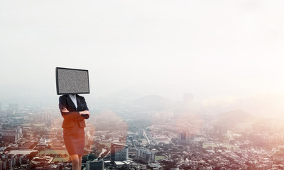 Business woman with TV instead of head.