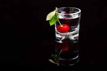 Sour cherry in a glass. Cherry drink