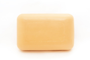 Hygiene toilet soap white and cream for children, close - up, isolated on a white background
