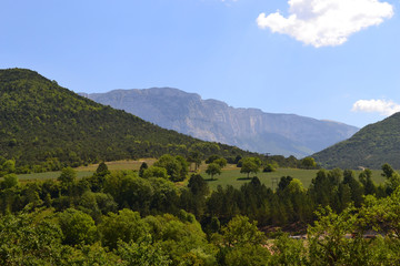 Fototapeta na wymiar Paysage du Col du Rousset et sur le Massif du Vercors, route sinueuse dans les montagnes du Vercors, Isère, France