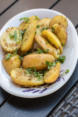  potatoes with herbs sprinkled with green parsley