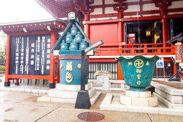Closeup of Green Sculptures near the temple Asakusa in rainy