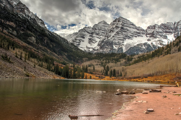 Maroon Bells with lake and clouds