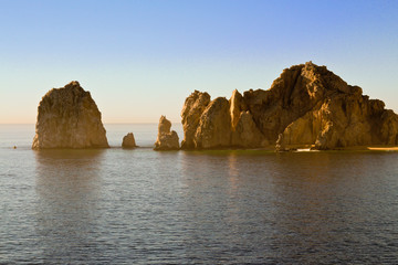 Rocks in the ocean on a sunny day