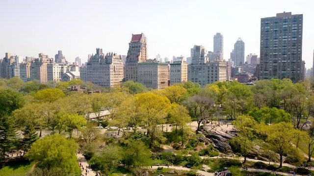 Aerial view of Central Park, New York, USA, Skyscrapers on background. Luxury residential buildings.