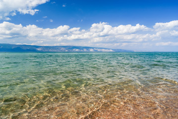 Close up shot of a sea waves on sunny day