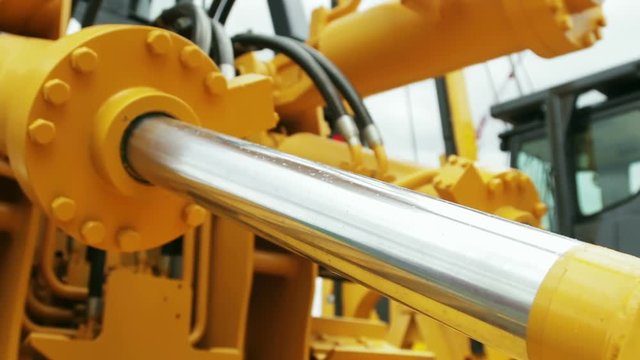 Hydraulic piston system for tractors, bulldozers, excavators. details of construction equipment