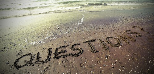 QUESTIONS text with question mark written in large letters