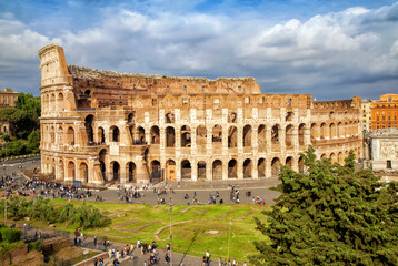 Fototapeta na wymiar Aerial scenic view of Colosseum in Rome, Italy. Colosseum is one of the main attractions of Rome. Rome architecture and landmark.