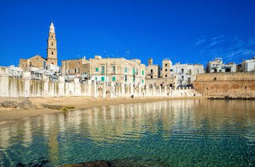 Scenic sight in Monopoli, province of Bari, region of Apulia, southern Italy. City scape harbor...