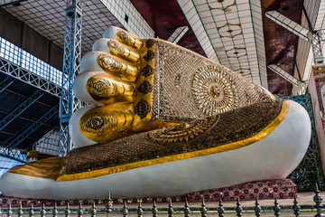 The feet of the  colossal statue of reclining Buddha in Bago, Myanmar