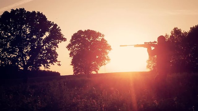The hunter goes forward and aim