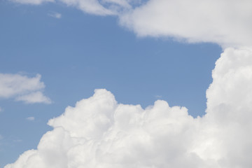 Naklejka na ściany i meble Blue sky and detailed clouds in a backgorund