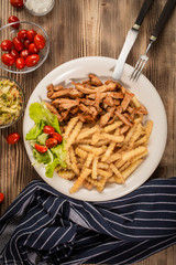 Greek gyros dis with fries and salad