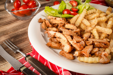 Greek gyros dis with fries and salad