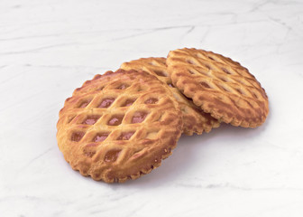 group of homemade cookies on white marble