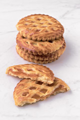 group of homemade cookies on white marble