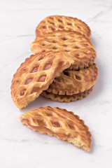 group of homemade cookies on white marble