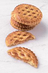 group of homemade cookies on white marble