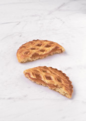 group of homemade cookies on white marble