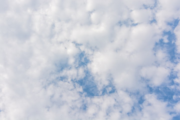 White clouds on the blue sky bankground