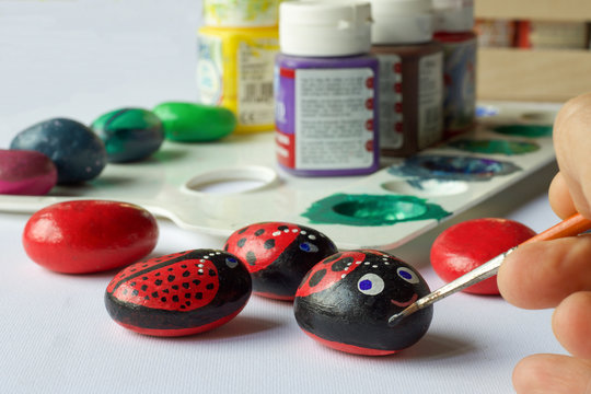 group of painted stones as leisure activity for children