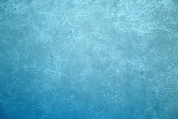 Texture background image of trendy colored wall with silvery or metallic shining plaster.