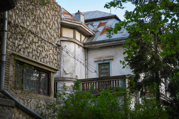 Fototapeta na wymiar Bucharest view - Historical buildings and vegetation in Cotroceni neighbourhood