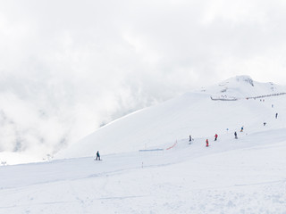 Fototapeta na wymiar Mountain skiers in the mountains in Russia