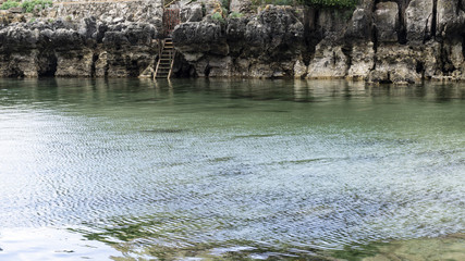 Clear and crystalline sea with rocks