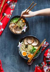 Japanese ramen soup with pork, egg and chives