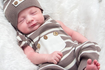 portrait of a sleeping infant baby boy