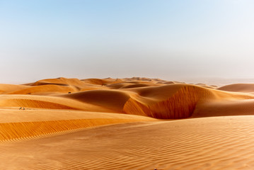 The dunes of the Wahiba Sands desert in Oman at sunset during a typical summer sand storm - 20