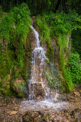 The summer view of small waterfall