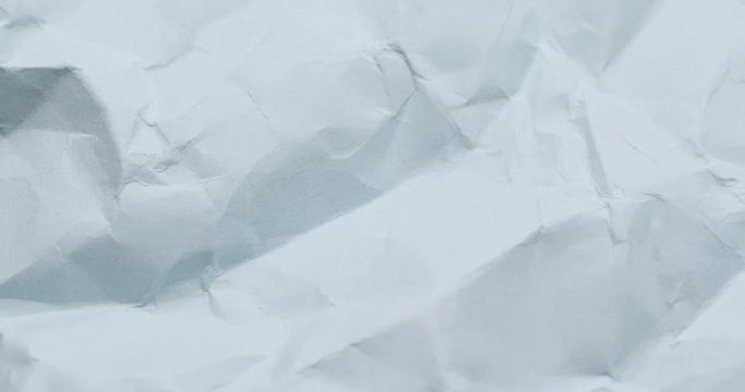 Wrinkle blue paper texture in rotation