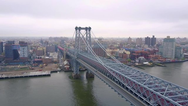 New York City skyline aerial of East River and Williamsburg Bridge drone shot.