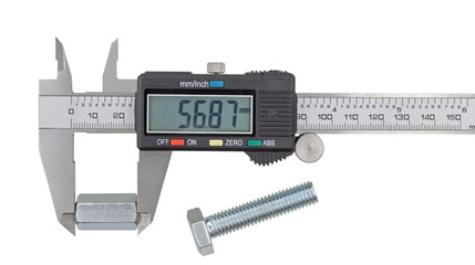 Measuring big steel nut with vernier calipers