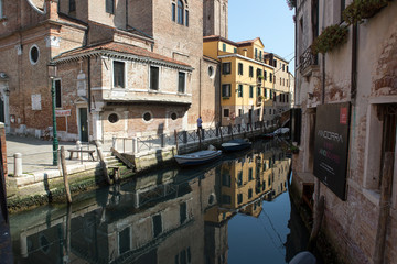 Fototapeta na wymiar Buildings on a canal in Venice