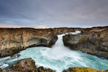 Aldeyjarfoss is an amazing waterfall in northern Iceland. Icelandic natural landscape at sunrise.