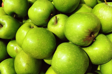 green apples in the shop window and the store, useful vegetarian food