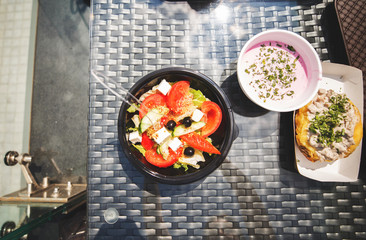 salad soup and hot for lunch on the table