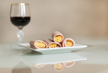 ham rolls with cheese, food, glass of wine