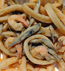 Frying fish with shrimp and squid